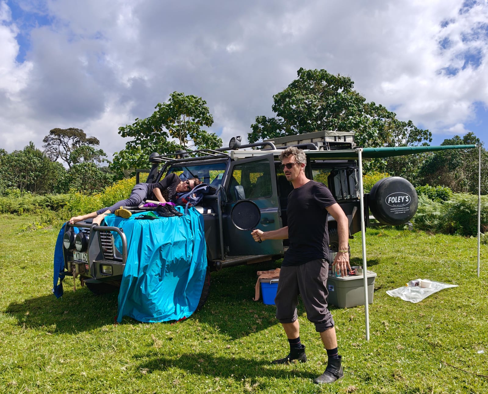 Camping canopy with turquoise shade