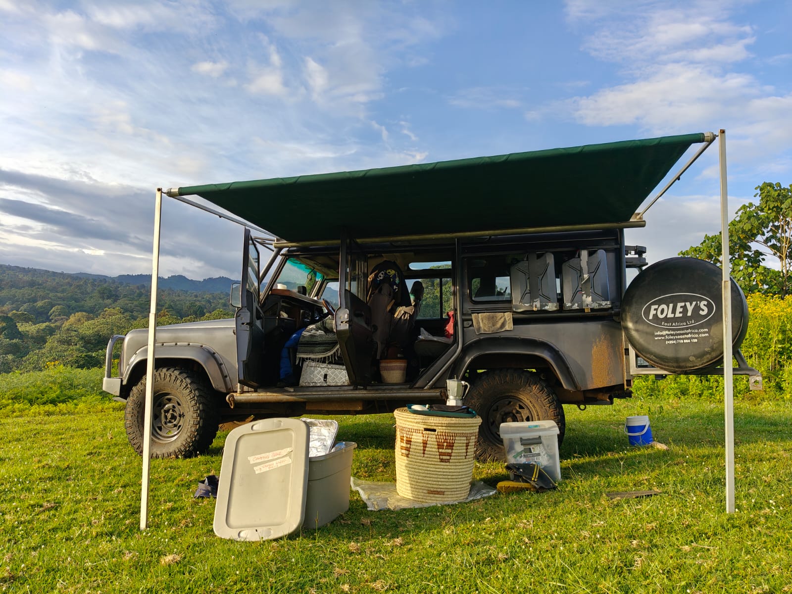 Open back camping setup with mountain view